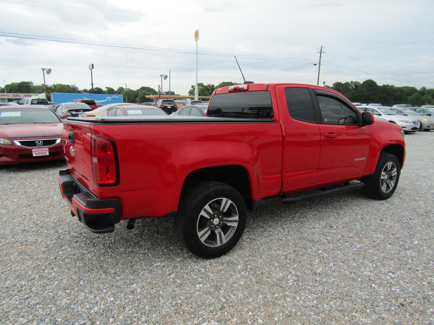 2017 Red /Gray Chevrolet Colorado Work Truck Ext. Cab 2WD (1GCHSBEA0H1) with an 2.5L L4 DOHC 16V GAS engine, 6A transmission, located at 15016 S Hwy 231, Midland City, AL, 36350, (334) 983-3001, 31.306210, -85.495277 - Photo#7